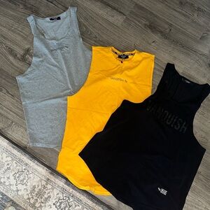 Three men’s tanks vanquish brand    New with kit tags never worn never washed